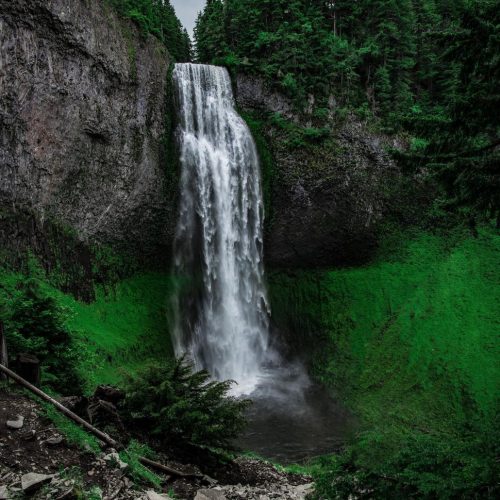 stunning-waterfall-cascading-into-a-lush-green-canyon.